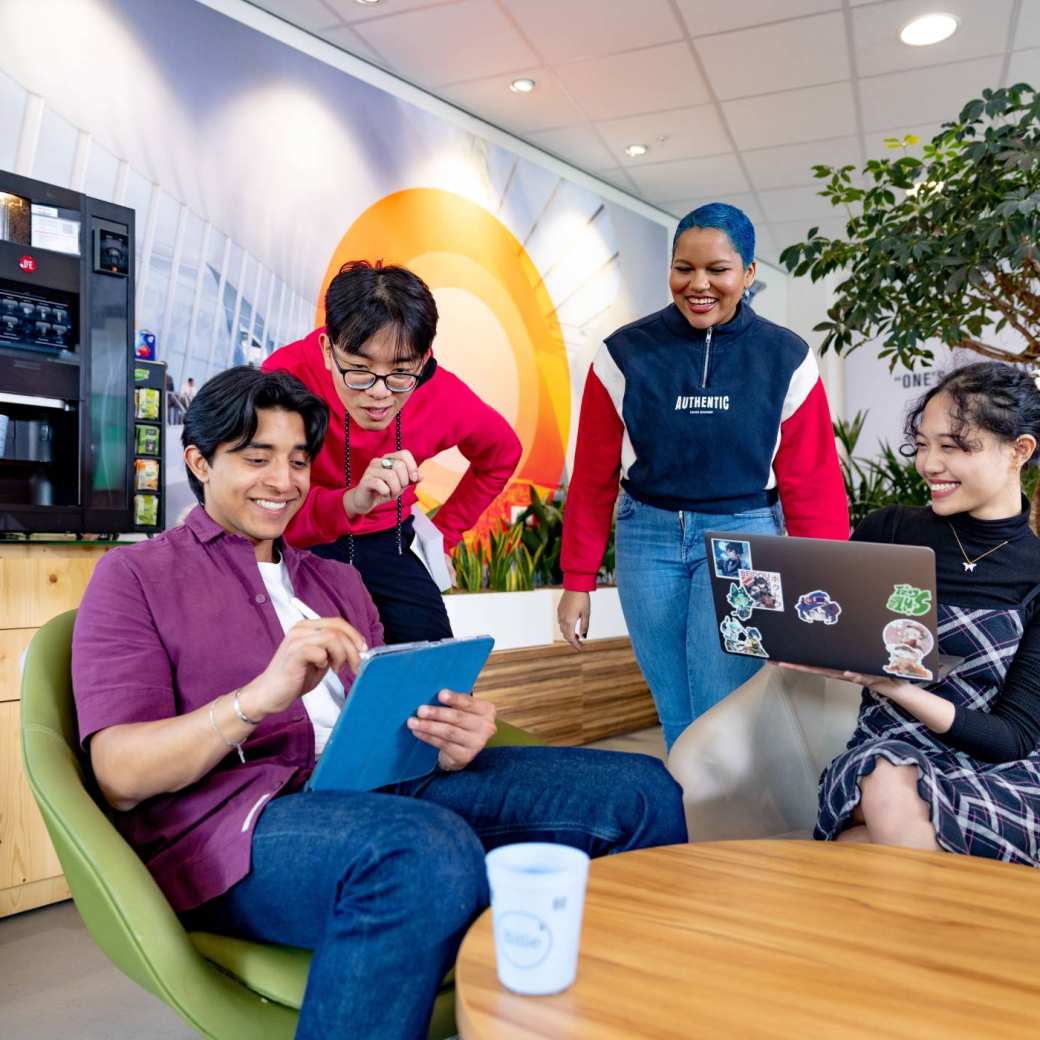 International students studying in the lounge on the Arnhem campus of HAN University of Applied Sciences. 