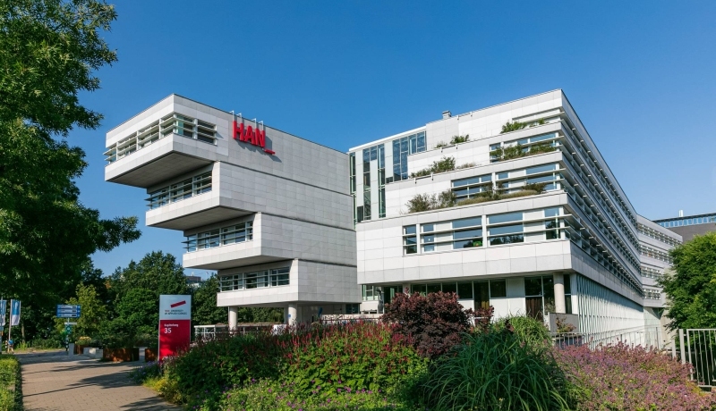 HAN University of Applied Sciences photo of the futuristic building and logo on Nijmegen campus Kapittelweg 35