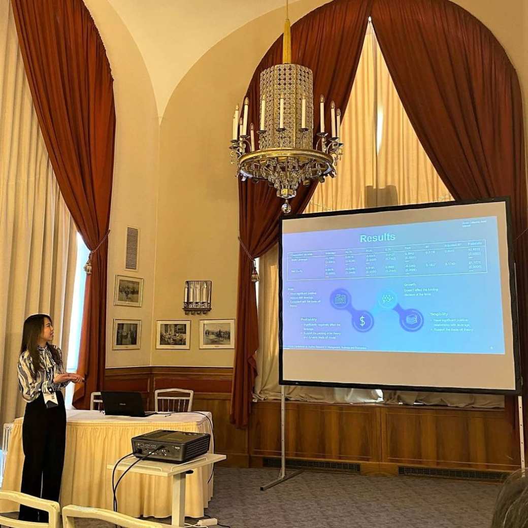 Zeren Lelaona presenting at a conference in Vienna.