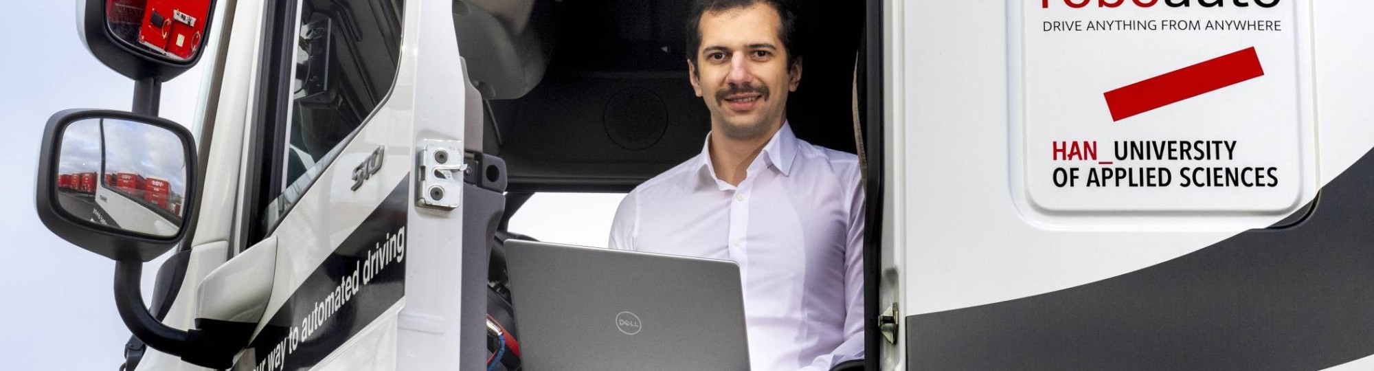 Master Engineering Systems student Radu Firtat in the V-tron truck. Photo: Gerard Burgers.