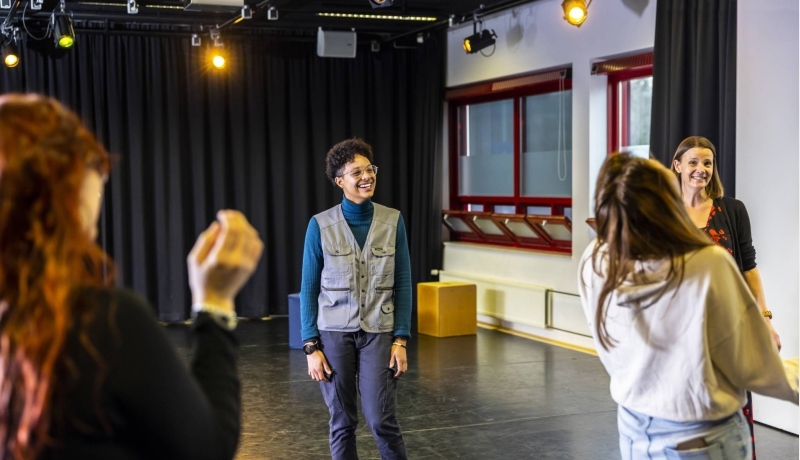 Female student laughs while present in class | Bachelor of International Social Work for international students in the Netherlands | HAN University of Applied Sciences